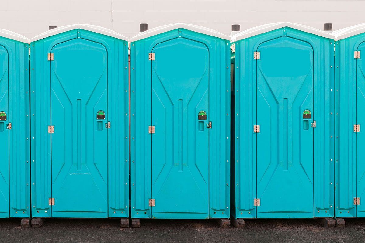 Industrial portable restroom units at a plant in Eagan, Minnesota